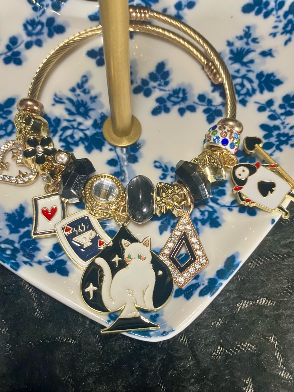 Gold Tone Cat Charm Bracelet with Black and White Enamel Accents